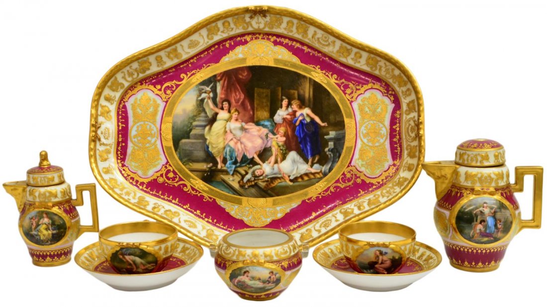 ROYAL VIENNA WAGNER PORCELAIN TEA SERVICE: (lot) Scarce Royal Vienna parcel gilt hand painted porcelain tea service, 19th c., each showing hand painted reserves on a heavily gilded ground with raised detail, titled and numbered (3547 and 3541)