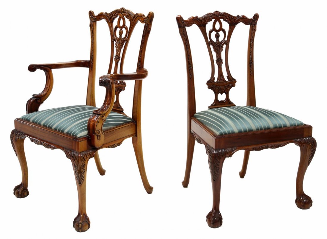 (16) CHIPPENDALE STYLE DINING CHAIRS: (16) Chippendale style mahogany dining chairs, late 20th c., purchased at Georgian Furnishing Co.,Ltd., New Orleans, a shaped crest rail above the shaped pierced splat, removable seat cushions with st