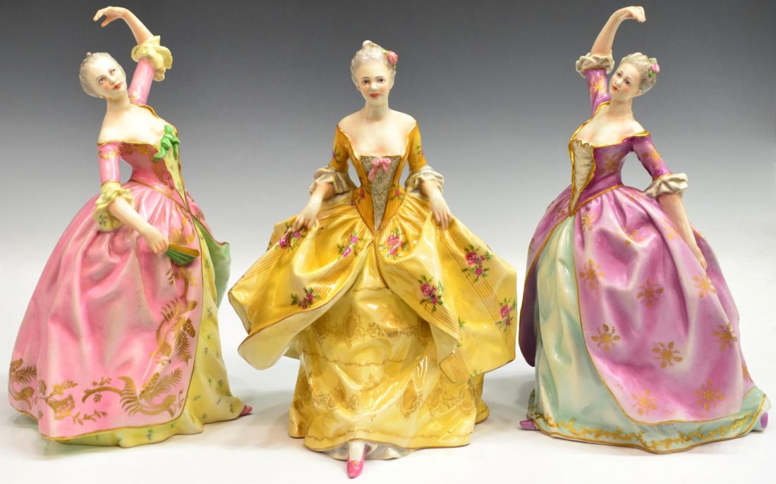 (3) ITALIAN CAPODIMONTE PORCELAIN BEAUTIES: (lot of 3) Italian Capodimonte porcelain figures, modeled as beauties in elaborate polychrome parcel gilt dresses, crown over 'N' Made In Italy mark underfoot, one with chip to dress, one intact with
