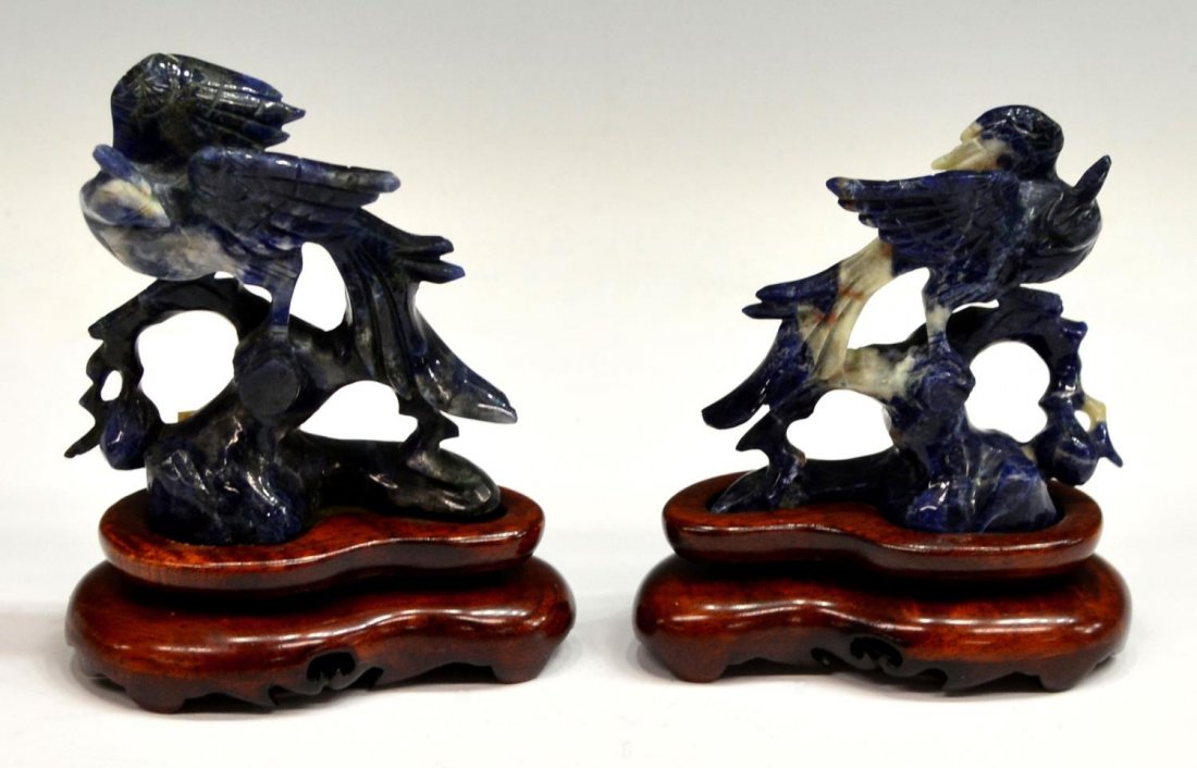 (2) CHINESE CARVED SODALITE BIRD FIGURES ON BASES: (pair) Chinese carved sodalite bird statues, each on a branched perch, wood bases, overall largest: 4.75"h, 1.25lbs total *Provenance: From the estate of noted San Antonio & Austin resident Todd Denma