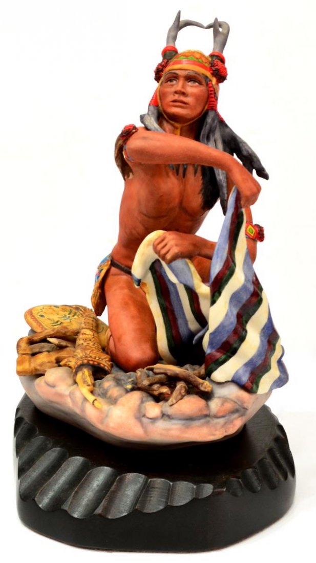 CYBIS NATIVE AMERICAN FIGURE, APACHE CHATO: Limited edition Cybis porcelain figure, "Apache Chato", from the North American Indian series, number 240, signed with copyright insignia on the backside, on a wood base, figure: approx 11.75"h, 7"w,