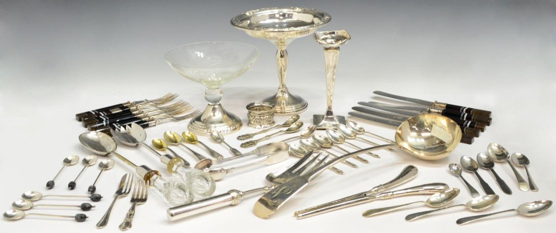 (LOT) STERLING SILVER & SILVERPLATE SERVICEWARE: (lot) Collection of weighted sterling silver and silver plate service and flatware, examples include (1) Duchin Creation etched glass compote, in a foliated pattern, (1) Oneida Heirloom compote in the
