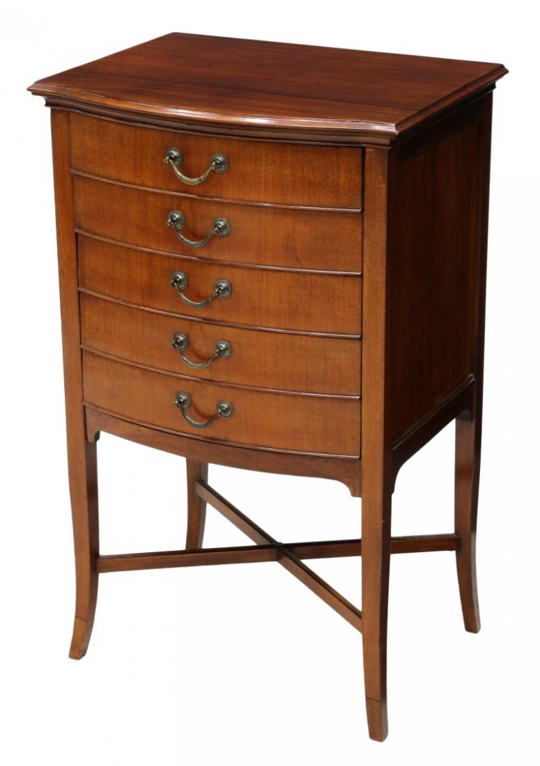 EDWARDIAN MAHOGANY MUSIC CABINET: Edwardian mahogany music cabinet, early 20th c., diminutive with a bow front, five drop front drawers, all rising on tapered square legs joined by a X form stretcher, 34.5"h, 21.25"w, 16.75"d Start Pr