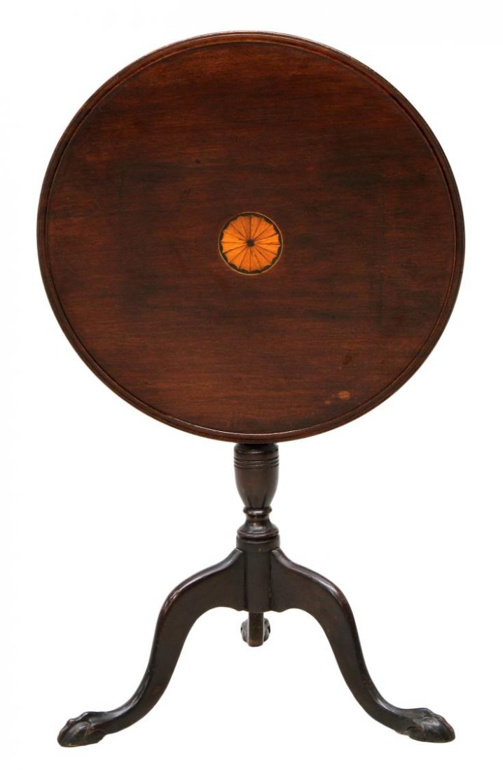 MAHOGANY INLAID TILT TOP TABLE: George II style inlaid mahogany tilt top table, having a circular top with central contrasting patera raised on the central turned pedestal with three cabriole claw foot legs, some surface wear, resto