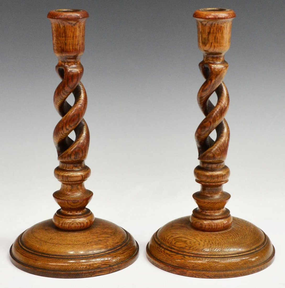 (PAIR) ENGLISH OPEN TWIST COLUMN CANDLE STICKS: (pair) English oak turned and open twist column candle holders on circular base, 10"h, 5.25"diameter, total: 1.25lbs Start Price: $50.00