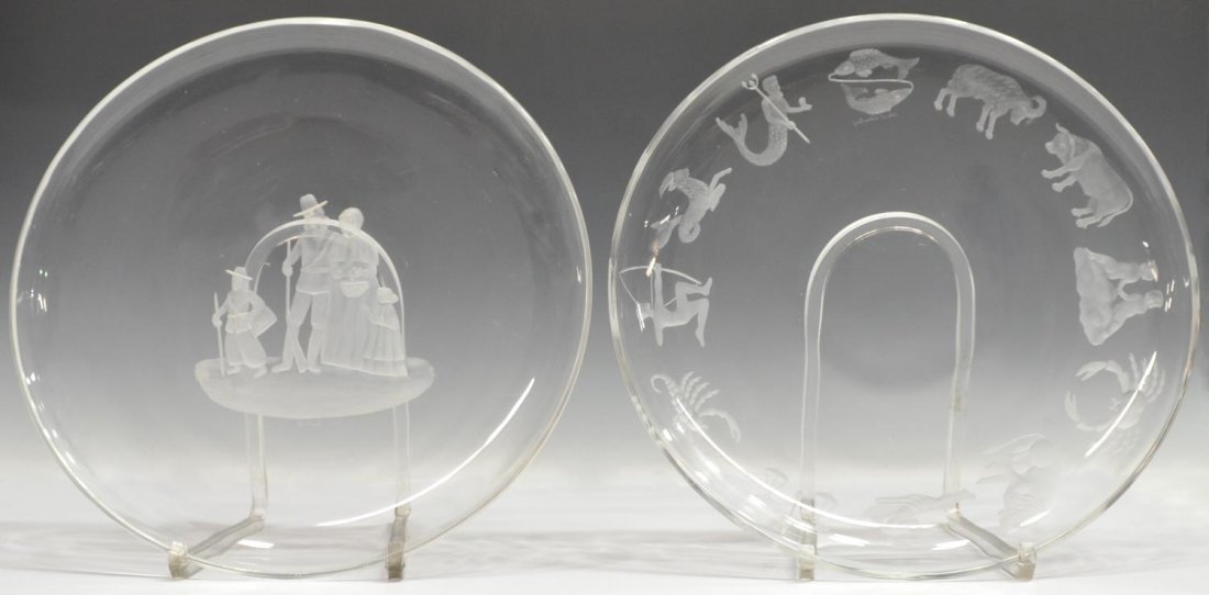 (2) LARGE VAL ST. LAMBERT COLOLESS ETCHED CHARGERS: (lot of 2) Val St. Lambert limited edition etched glass collectors plates, comprising: (1) 'Pilgrim Family', dated 1969, Americana collection, edition number 525 (?), script signed, 1"h, 11.75"diam; (