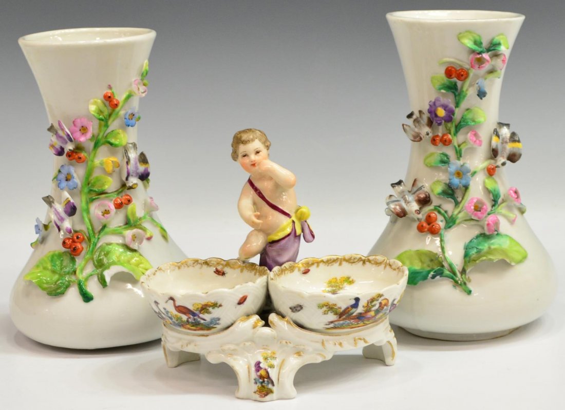 (3) KPM FIGURAL DOUBLE OPEN SALT & FLORAL VASES: (lot of 3) Continental ceramic table items, comprising: (1) German parcel gilt figural open salt, KPM, a scantily clad putti seated behind two open salts, each centered with polychrome birds in a land