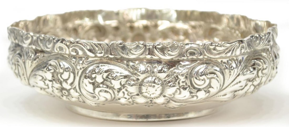 BLACK STARR & FROST REPOUSSE STERLING LOW BOWL: American sterling silver low bowl, Black Starr & Frost, undulating edges supported by repousse floral walls, triple monogram to central well, 6.5"diam, 10.22ozt Start Price: $100.00