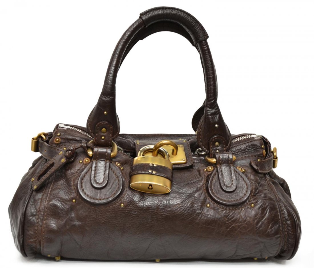 CHLOE PADDINGTON LEATHER SHOULDER BAG: Chloe 'Paddington' leather shoulder bag, brass padlock and key, dual zipper to top, beige canvas interior with zipper and slot pocket, bag: approx 7"h, 14.5"w, 8"d, 2.5lbs Start Price: $150.00