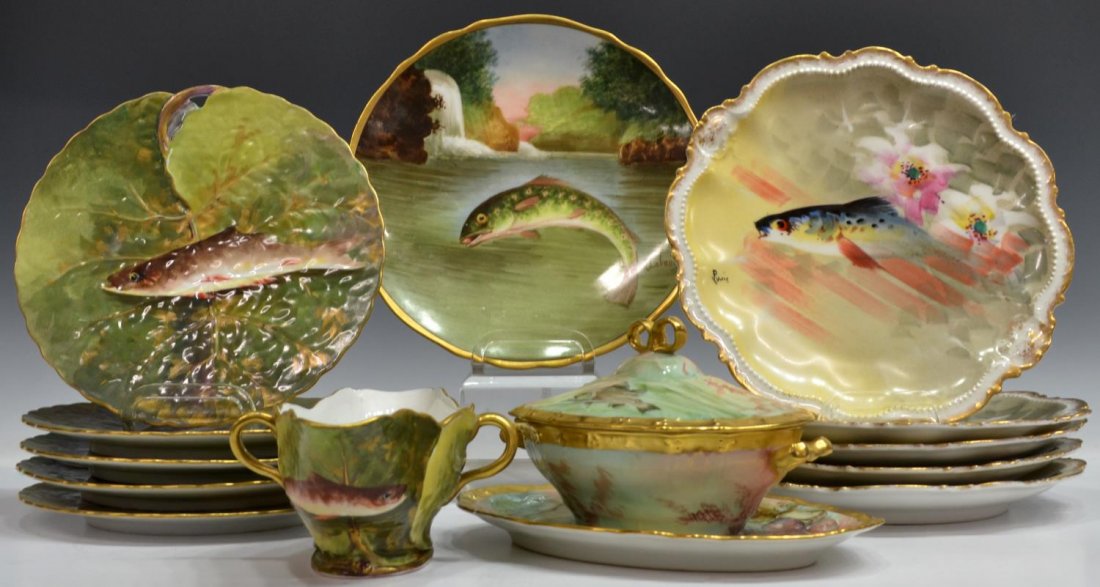 (13) GROUP LIMOGES PORCELAIN FISH PLATES, DISHES: (lot of 13) French Limoges hand painted parcel gilt porcelain tableware, each having polychrome fish motif, comprising: (5) Coronet plates, signed lower left Puvil (?), 9.75"diam; (1) Jean Pouyat grav
