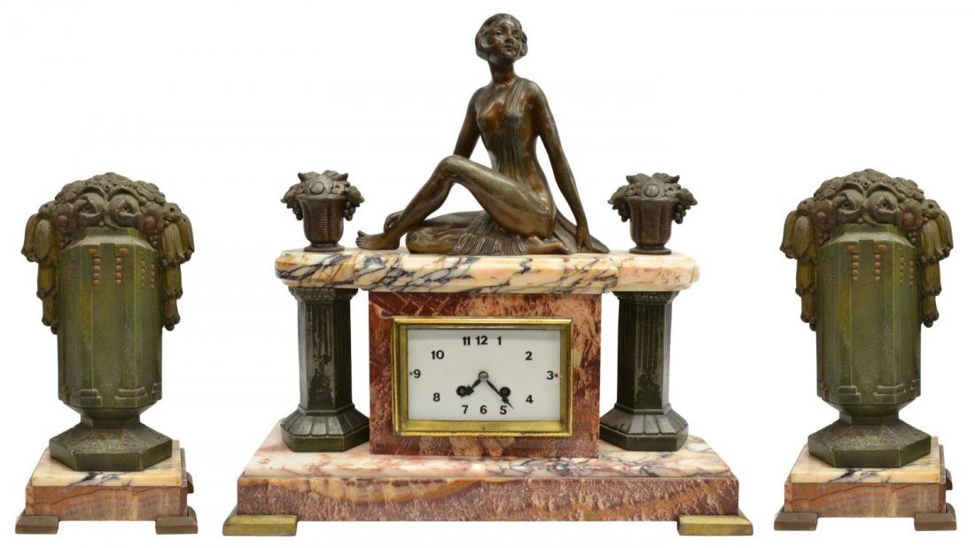 (3) ART DECO FIGURAL MARBLE GARNITURE CLOCK SET: (set of 3) Art Deco clock garniture set, a seated woman with floral baskets resting atop the marble clock, the clock face with Arabic numerals flanked by two columns, works marked France, 17.5"h, 17.7