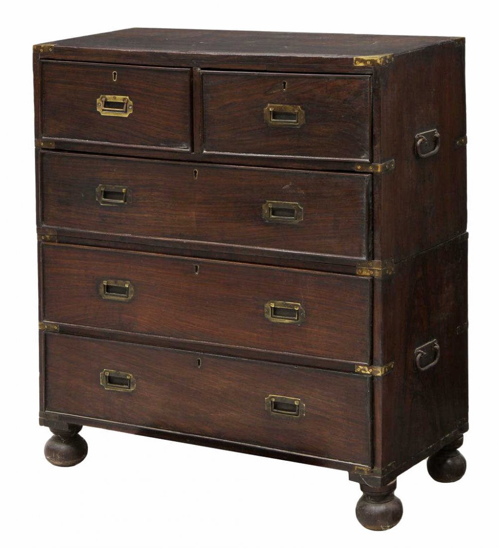 BRITISH COLONIAL ROSEWOOD CAMPAIGN CHEST: British Colonial rosewood two-part campaign chest, 19th c., fitted with two short and three long drawers, each with brass bindings, inset handles, and side carrying handles, raised on stemmed bun feet