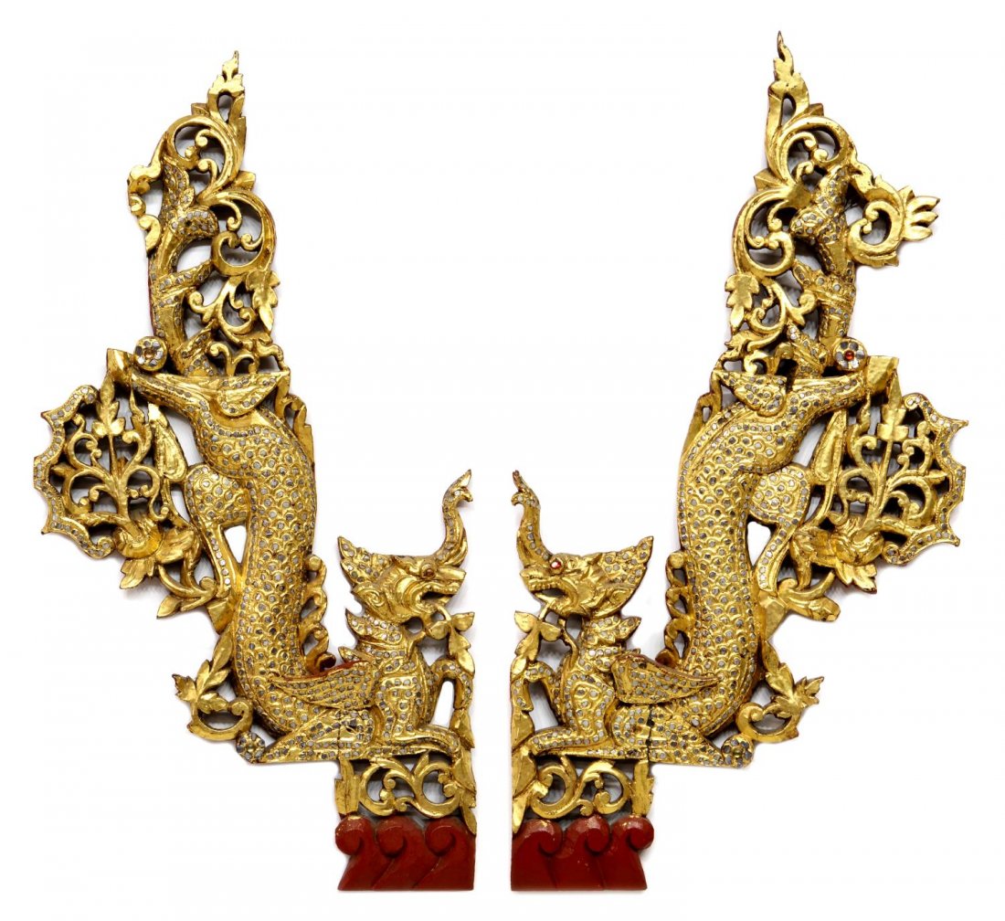 (PAIR) BURMESE GILTWOOD ARCHITECTURAL PANELS: (pair) Burmese carved giltwood architectural panels, late 19th/early 20th c., each modeled as a pyinsa rupa in the Mandalay style, mica and colored glass accents throughout, red lacquer backside, 29.5