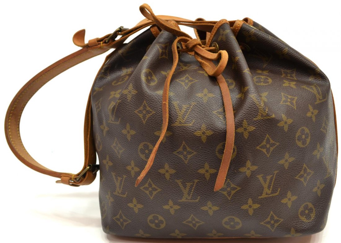 LOUIS VUITTON PETIT NOE DRAWSTRING SHOULDER BAG: Louis Vuitton "Petit Noe" drawstring shoulder bag in monogram canvas, with long adjustable strap, some stains and wear to leather trim, bag: approx 9.5"h, 10.5"w, 7.75"d, 1lb Start Price: $250.00