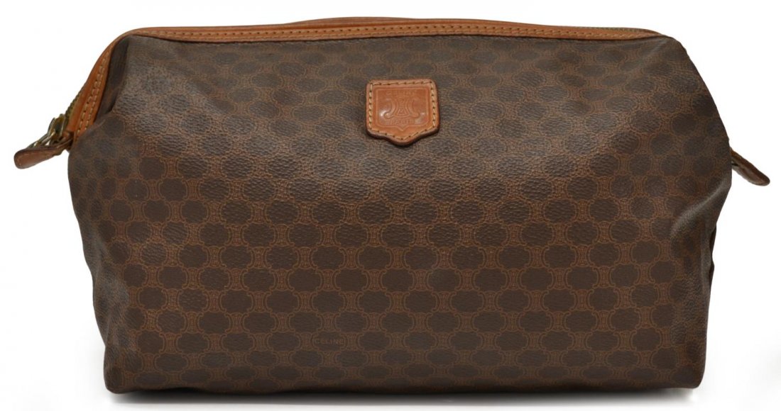 VINTAGE CELINE MACADAM MONOGRAM CANVAS POUCH: Vintage Celine macadam monogram canvas toiletries pouch in brown, tan lined interior with two slit pockets, some wear and holes to interior, bag: approx 7.5"h, 11.5"w, 4"d, .75lb Start Price: $50.00