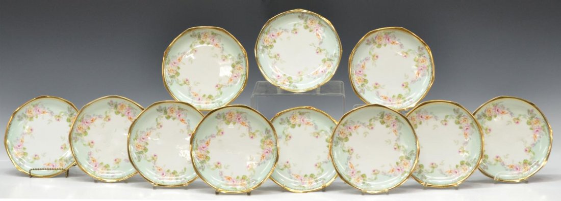 (11) AUSTRIAN MZ HAND PAINTED PORCELAIN PLATES: (set of 11) Austrian MZ (Moritz Zdekauer) porcelain plates, transfer and hand painted flowers and foliage on a white and pale green ground, gilt trim, marked underfoot, additional mark as pictured, ap
