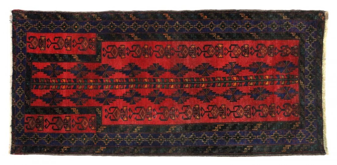 SEMI-ANTIQUE AFGHAN BELOUCH WOOL RUG: Afghan Belouch hand tied wool rug, mid 20th c., 5'5"l, 2'5"w Start Price: $100.00