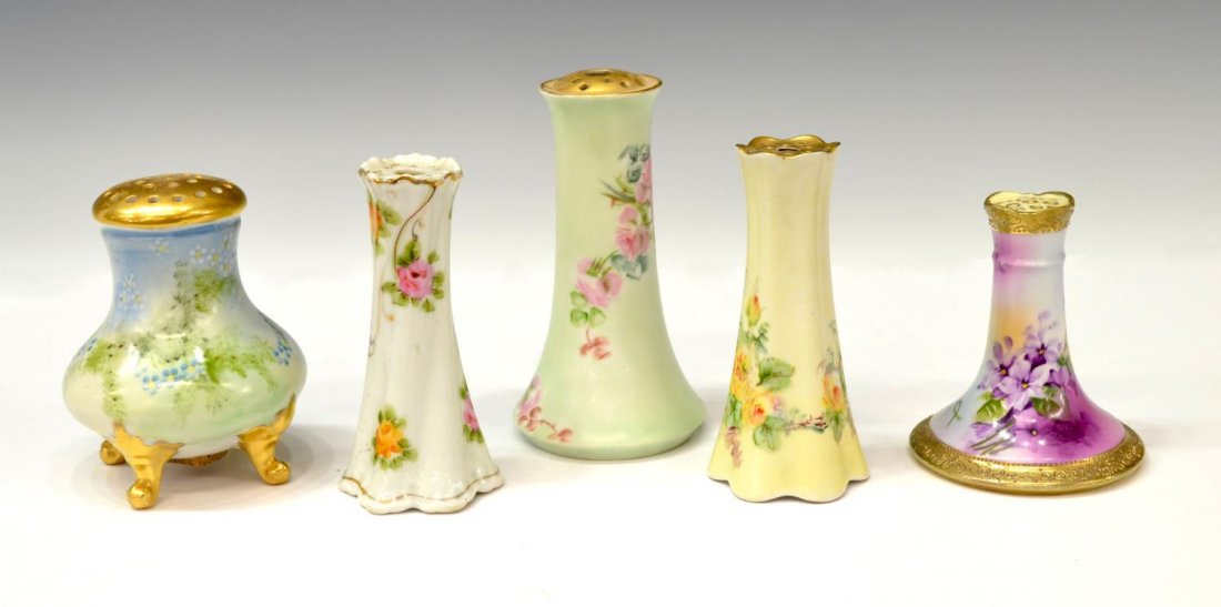 (5) CONTINENTAL & OTHER PAINTED HAT PIN HOLDERS: (lot of 5) Group of Continental and other hand painted porcelain hat pin holders, comprising: (2) Bavarian, each decorated with flowers, largest: 5.25"h, 3"w; (1) Nippon, purple flowers enclosed by gi