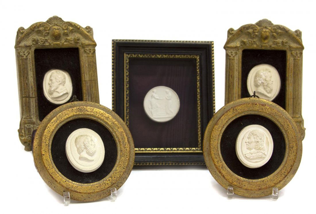 (5) FRAMED MINIATURE CAMEO BUSTS: (lot of 5) Miniature cameos in parcel gilt frames of plaster or parian ware, 20th c, four showing the relief busts of male figures, one showing ancient Roman figures, some cracks in frame moldings, la