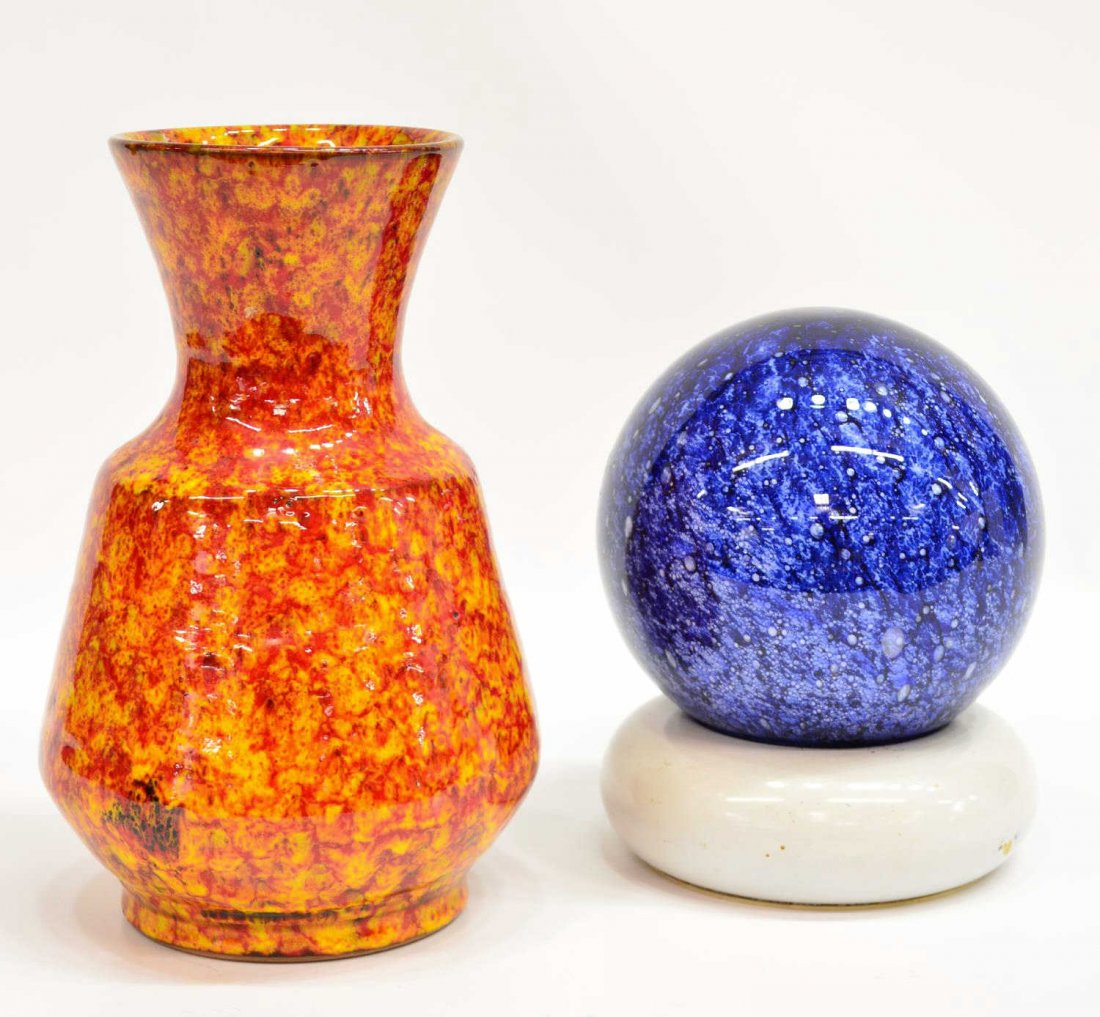 (2) ITALIAN ART GLASS ORB LAMP & POTTERY VASE: (lot of 2) Italian art glass table lamp, a mottled blue or with bubbles throughout, set on an enameled metal base, in need of wiring, approx 7.75"h; together with an Italian art pottery vase in an ora