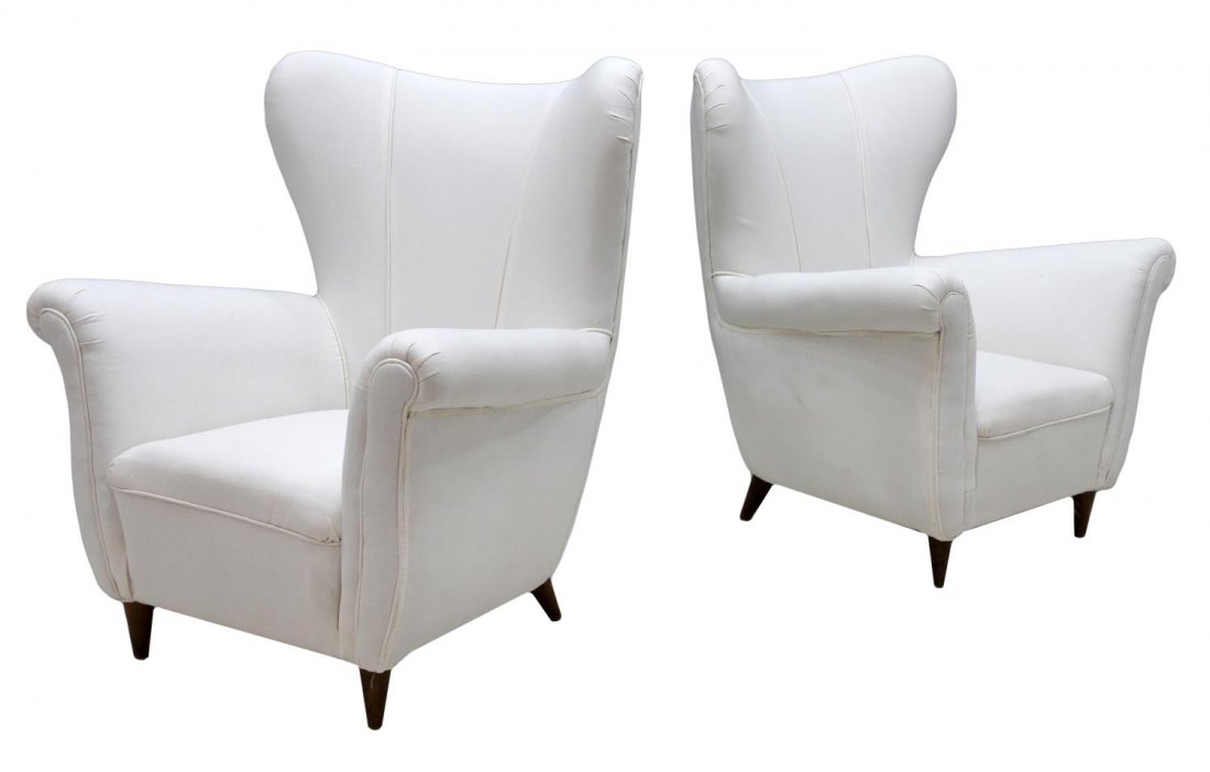 (2) ITALIAN MID-CENTURY MODERN CLUB CHAIRS: (lot of 2) Italian mid-century modern wingback club chairs with recent white upholstery on short wood legs, 38"h, 33"w, 29.5"d Start Price: $700.00