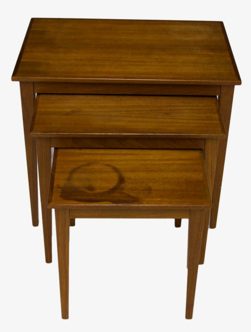 DANISH MID-CENTURY MODERN TEAKWOOD NEST OF TABLES: Danish mid-century modern teakwood nest of three tables rising on square legs, water rings, largest: 19.75"h, 23"w, 16"d Start Price: $50.00