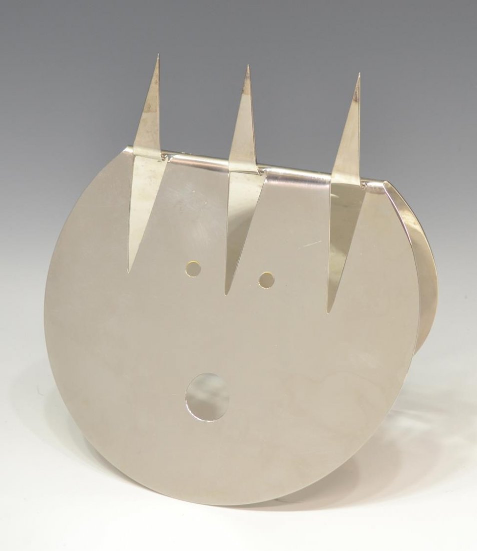 GIO PONTI FOR SABATTINI, THE WITCH AND THE MOON: Italian silvered metal mask, 'The Witch and the Moon', Gio Ponti (Italian, 1891-1979) for Lino Sabattini (Italian, b. 1925), 1978, stamped verso, approx 8.5"h, 7.5"w, 4.5"d, 1.5lbs Start Price: $800.0