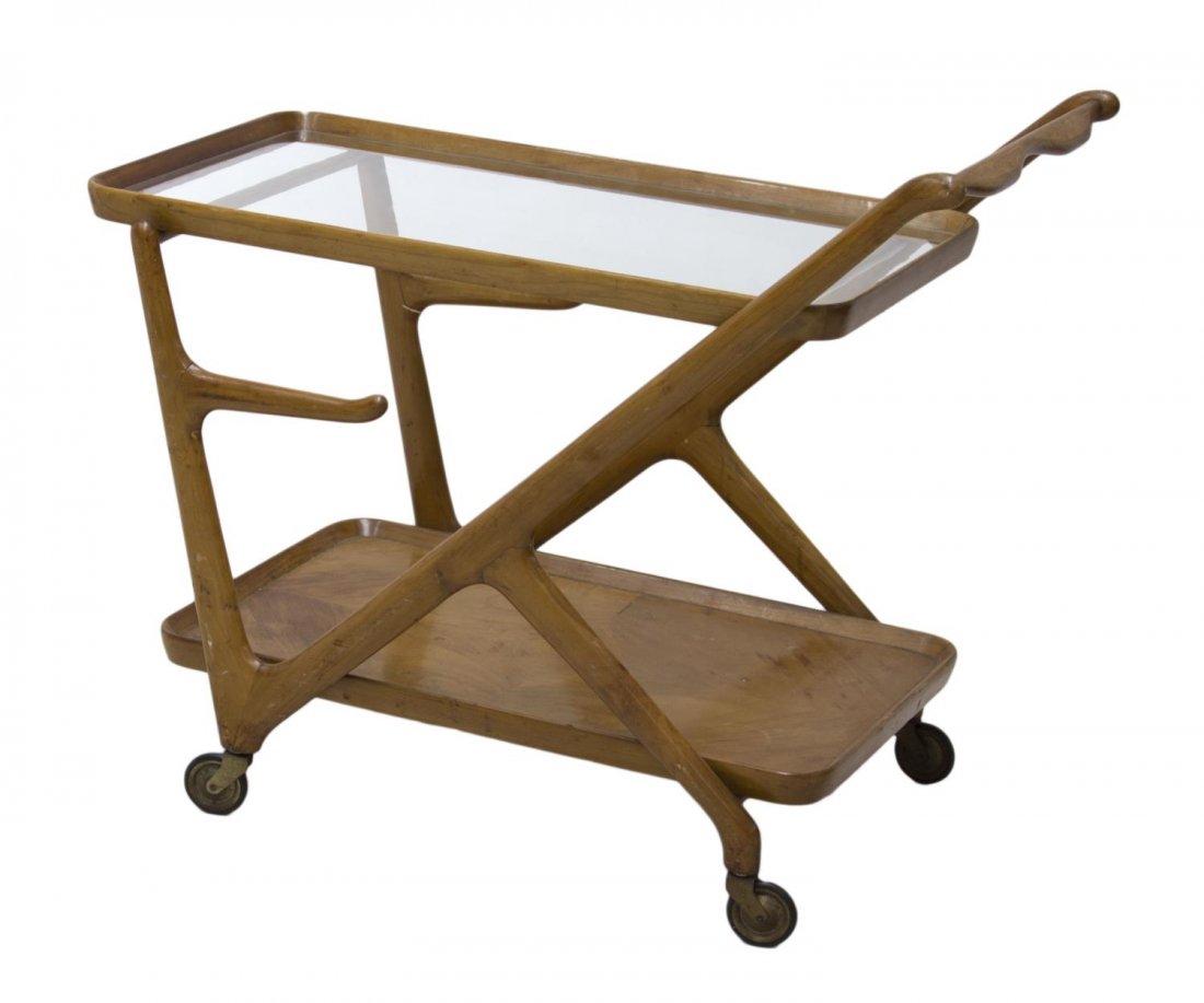 ITALIAN MID-CENTURY MODERN TEA CART: Italian mid-century modern service cart in the style of designer Cesare Lacca (Italian, 20th c.), the upper glass tier over the lower wood tier, rising on castors, lacking shelf, 28"h, 17"w, 3"d Start