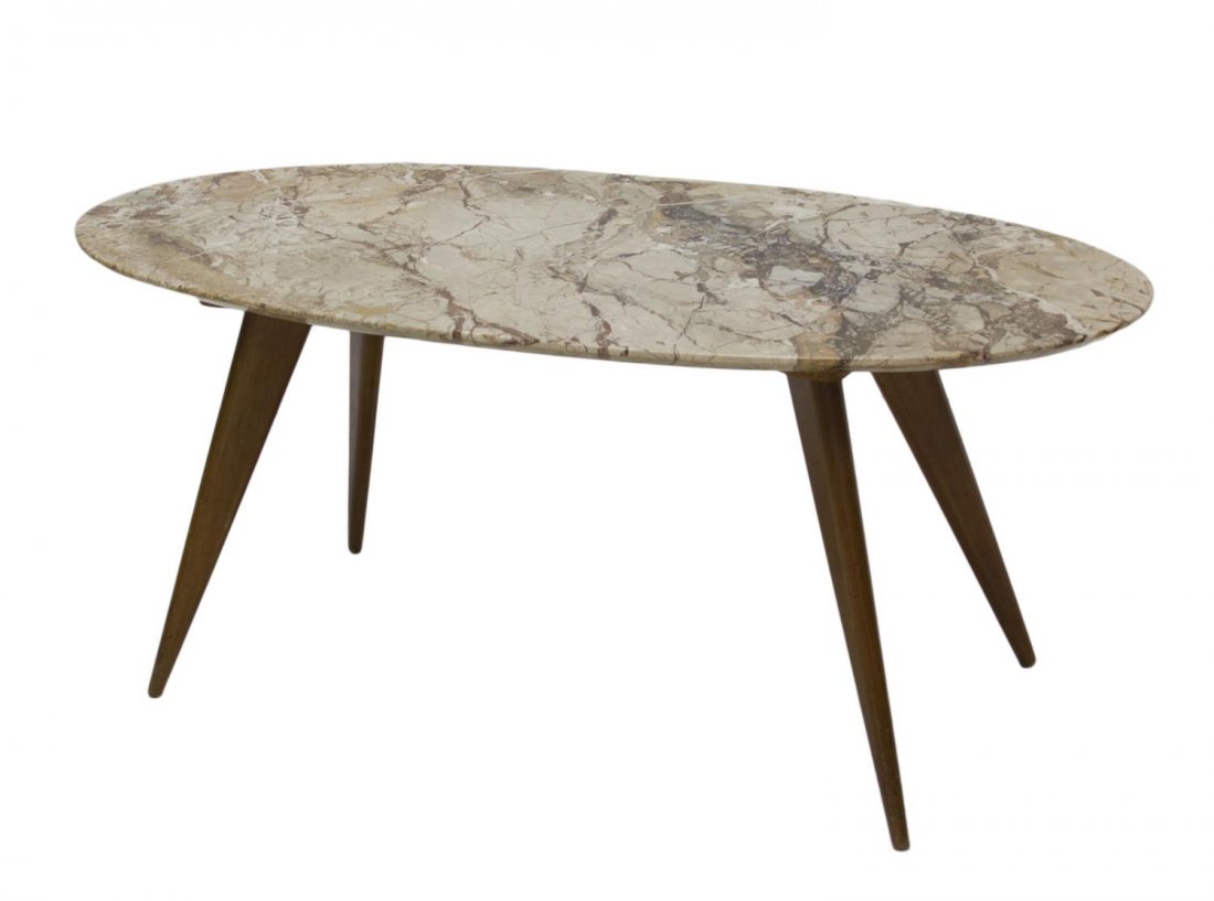 ITALIAN MID-CENTURY MODERN MARBLE TOP COFFEE TABLE: Italian mid-century coffee table, c. 1950, the long oval variegated marble top, raised on a angled supports of tapered form, approx 16"h, 38"l, 18"w Start Price: $150.00