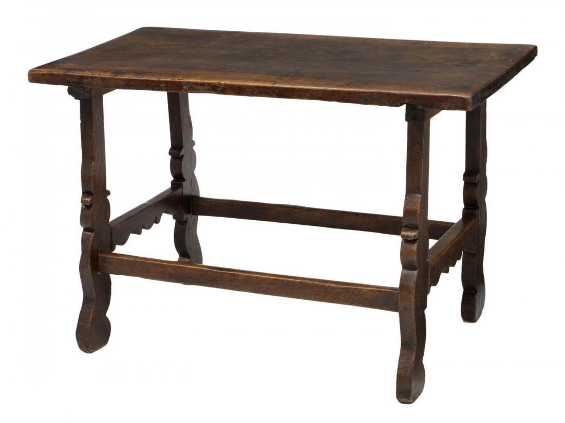 SPAIN SINGLE BOARD TOP WORK TABLE, 23"x45": Rustic oak work table, Northern, Spain, 18th c., the rectangular single board top raised on ox yoke form legs with mortise and tenon joinery, several holes in top, scrolled feet, 30"h, 45.5"w, 23.75"d