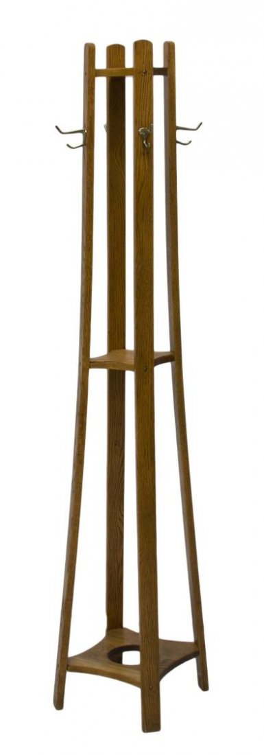 AMERICAN OAK COAT RACK: American oak coat rack, early 20th c., having four angled vertical boards joined by a small circular shelf at top and a larger circular shelf at the base, four brass coat hooks, 65"h, 15.75"w, 15.75"d