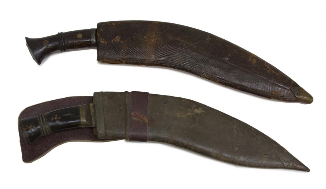 (2) NEPAL GHURKA KUKRI KNIVES: (lot of 2) Nepal Kukri knives: (1) wood handle, the blade with possibly spurious WWI marks, blade maximum: 13.5"l, with leather scabbard: 18.5"l; (1) wood handle, blade maximum: 12.75"l, the scabbard 