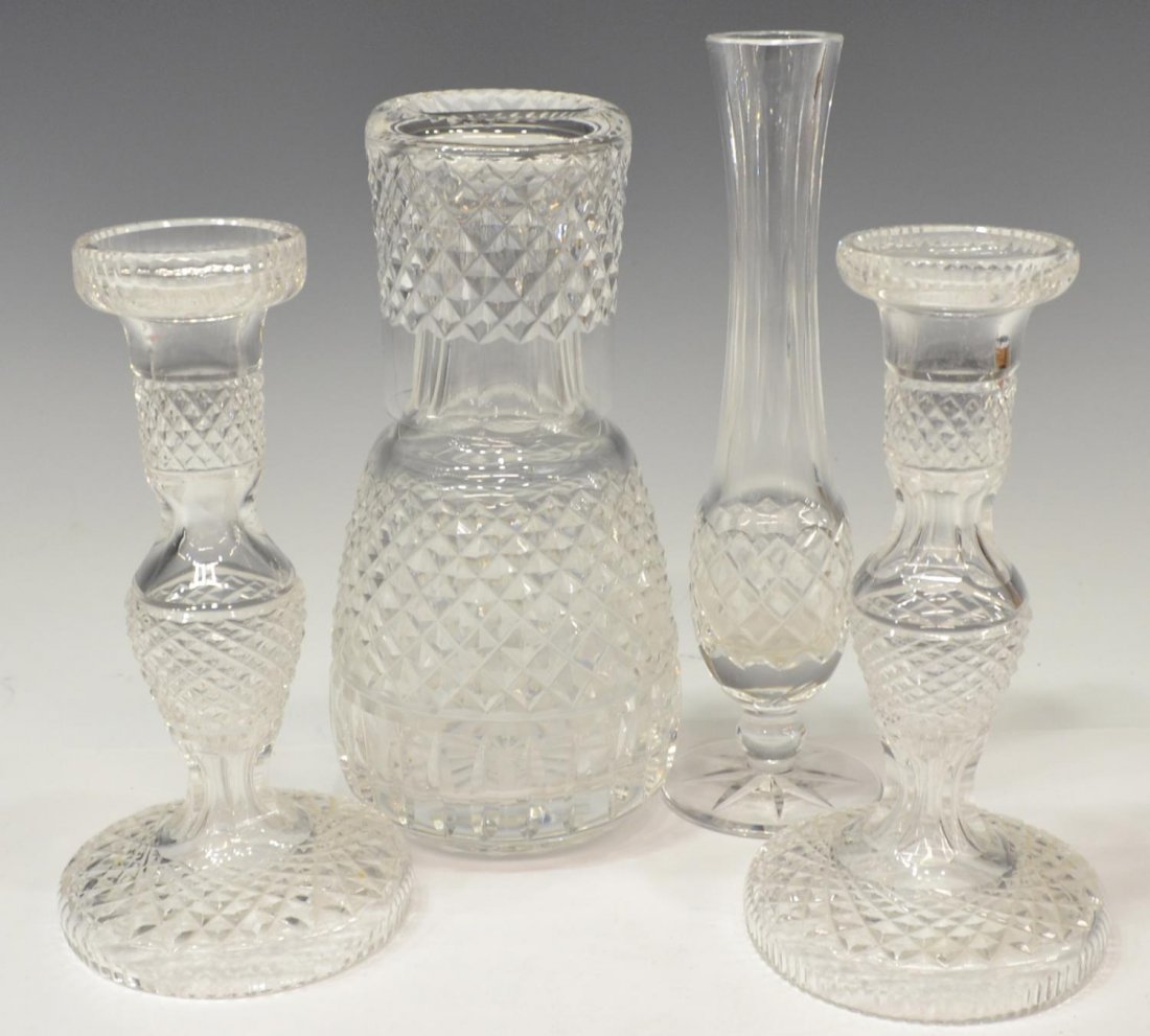 (5) WATERFORD CUT GLASS TUMBLE-UP, CANDLESTICKS: (lot of 5) Group of Waterford cut glass tableware, comprising: (2) similar diamond pattern candlesticks, 7.5"h largest; (2) tumble-up set, matching diamond pattern, including cup and bottle, 8.5"h; (1