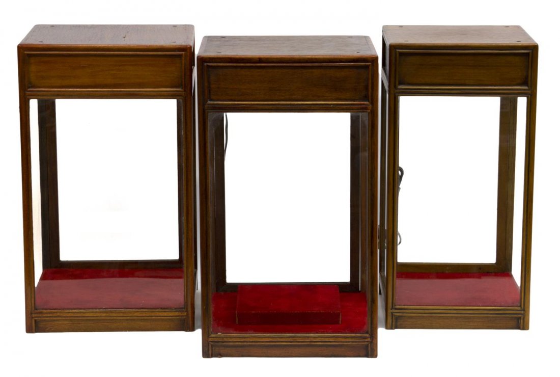 (3)LIGHTED WOOD & GLASS TABLE TOP DISPLAY CABINETS: (lot of 3) Table top display cases, of similar design, each with four glass sides held by a wood frame, lighting from the roof of case, red velvet liner, hinged door at back, slight wear and splitting