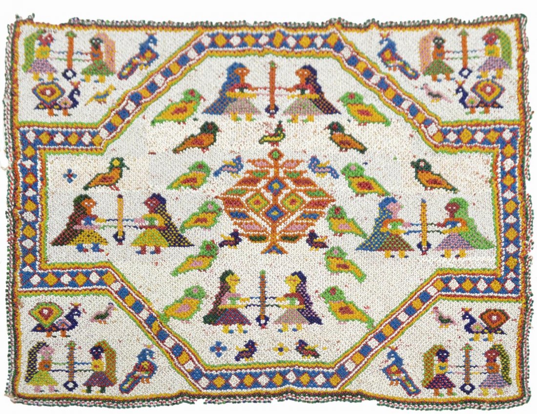 ANTIQUE GLASS BEADED CHAKLA PANEL, GUJARAT, INDIA: Beaded Chakla panel, possibly Kathi tribe, Gujarat region, India, early 20th c., polychrome glass beads woven in geometrical patterns with figures and birds on a white ground, slight loss around the b