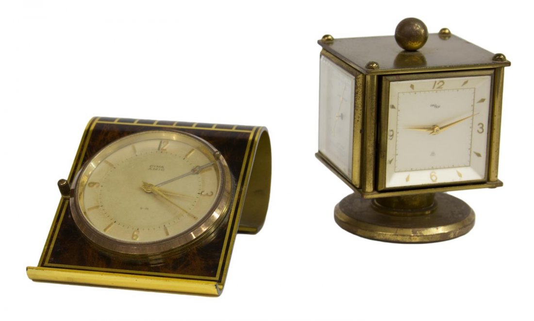 (2)IMHOF WEATHER CLOCK & ART DECO STYLE CYMA CLOCK: (lot of 2) Table clocks, comprising: (1) IMHOF Swiss four-sided rotating brass weather clock, sides including a clock, hygrometer, barometer and thermometer, 4.25"h, 3"w, 3"d; (1) Art Deco style Cyma 