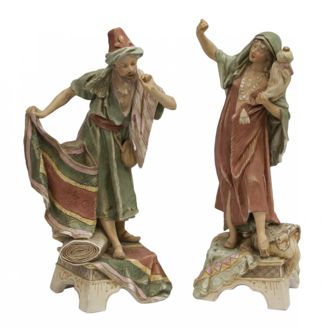 (2) ROYAL DUX ORIENTALIST MAIDEN & CARPET SELLER: (lot of 2) Royal Dux porcelain Orientalist figures, Bohemian, 'Carpet Seller', 465 and 'Maiden', 466, each figure polychrome decorated, standing on a shaped base, the Maiden with loss to shawl and thu