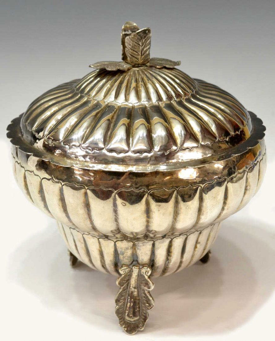 LARGE FOLIATED & REEDED DISH WITH LEAF SUPPORTS: Reeded silver dish, the conforming lid surmounted by a budding foliate finial, the whole raised on three leaf form supports, unmarked, tested by assayer as silver, approx 7"h, 6,25diam, 24.75 ozt *Pro