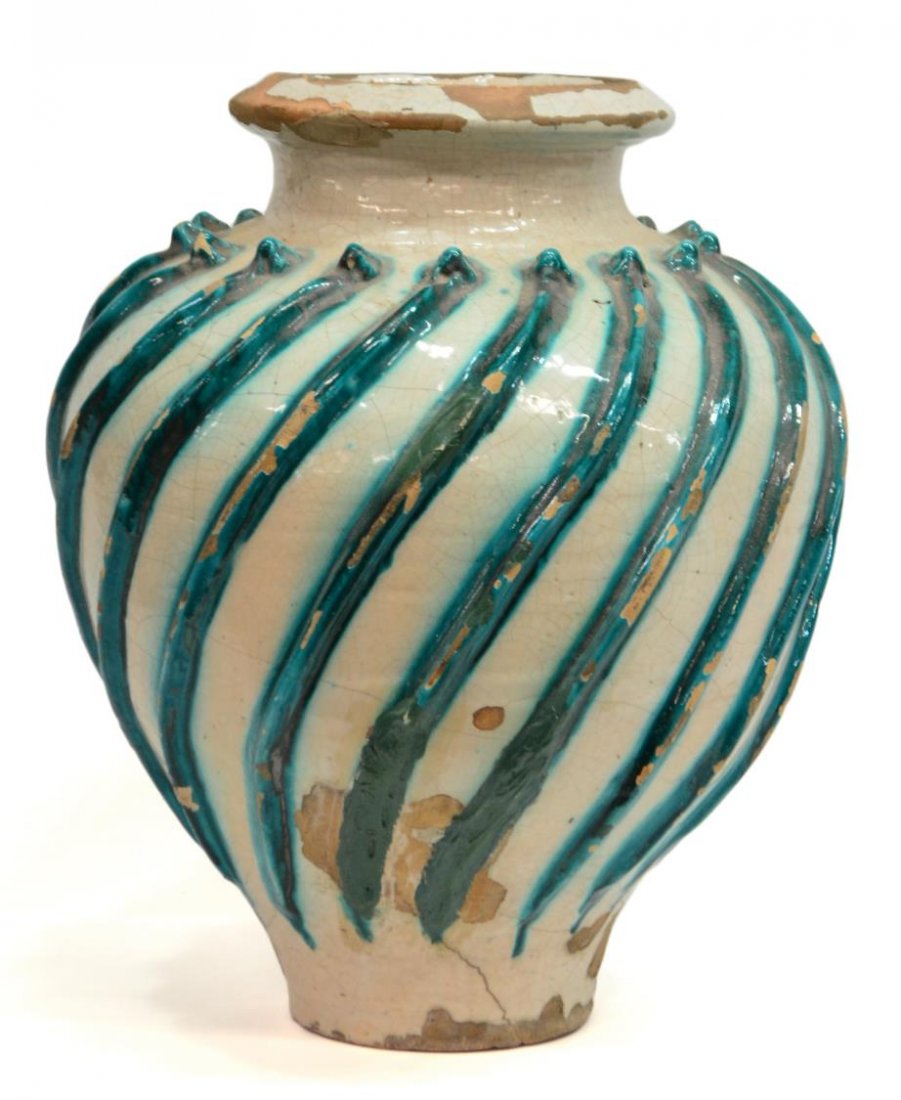 ANTIQUE SPIRAL RIB CRACKLE GLAZE JAR, SPAIN: Antique earthenware jar, Spain, possibly 18th c., raised greenish blue spiral ribs on a crackle glaze ground, intact with glaze loss, some chips, base with hairlines, marked Spain underfoot, approx 21