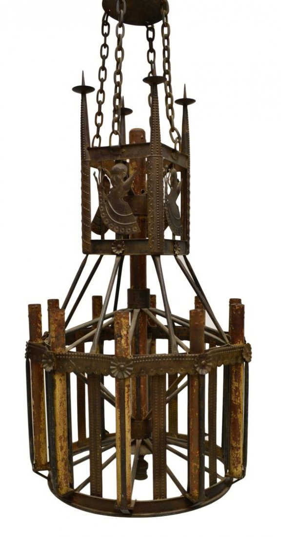 CONTINENTAL IRON ELEVEN-LIGHT CHANDELIER: Continental iron eleven-light candelier, 19th c., a top square frame adorned with figural portraits and candle prickets centering a single candle holder, over a circular ring with spokes supporting te
