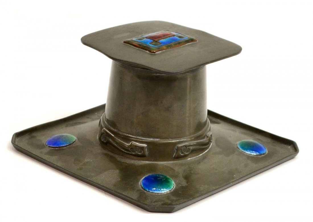 ARTS & CRAFTS LIBERTY & CO. ENAMLED PEWTER INKWELL: English Arts & Crafts enameled pewter inkwell, design attributed to Archibald Knox (1864-1933), Liberty & Company, stamped 9, Tudric, 0141, the hinged rectangular lid with polychrome enamel panel, ope