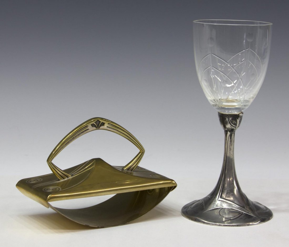 (2) ART NOUVEAU WMF BLOTTER & SILVERPLATE GOBLET: (lot of 2) Art Nouveau metalware group: (1) Gilt metal Art Nouveau blotter, WMF (Wurttemberg Metalware Factory), 3.5"h, 4.5"l, 2.25"w; (1) goblet, the colorless cut glass bowl, raised on a silverplate