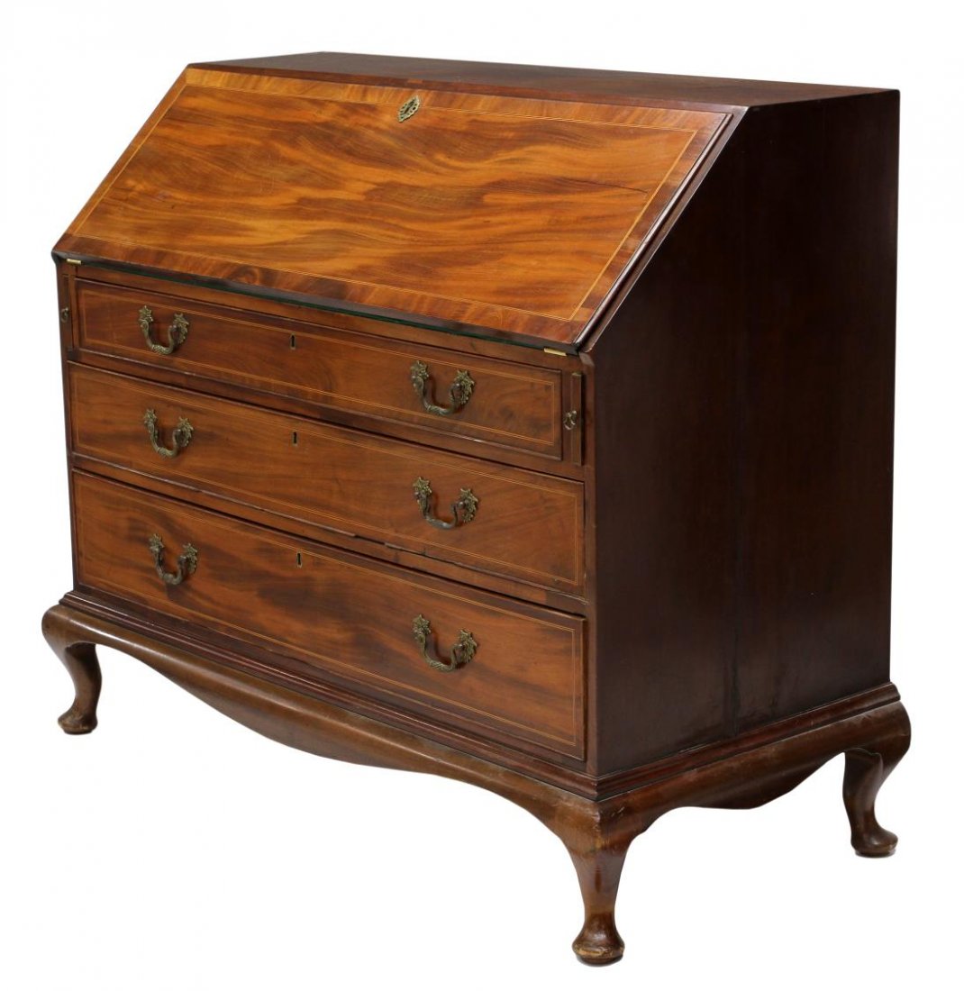 FINE GEORGIAN MAHOGANY BUREAU: Georgian mahogany bureau, 18th c., with string inlay decoration, the slant front opens to a writing surface and fitted nine drawer gallery with cubby holes, three lower front drawers, rising on short 