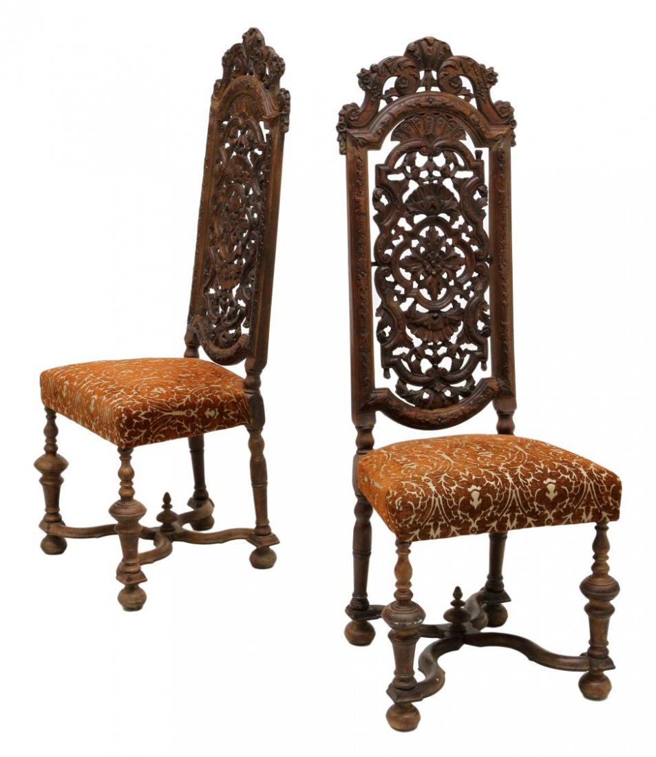 (PAIR) WILLIAM & MARY HIGH BACK CHAIRS, C. 1700: (pair) William & Mary period chairs, c. 1700, an arched pierced foliate carved crest rail over the open highly carved back splat framed by relief carved stiles, later seat upholstery, raised on turned