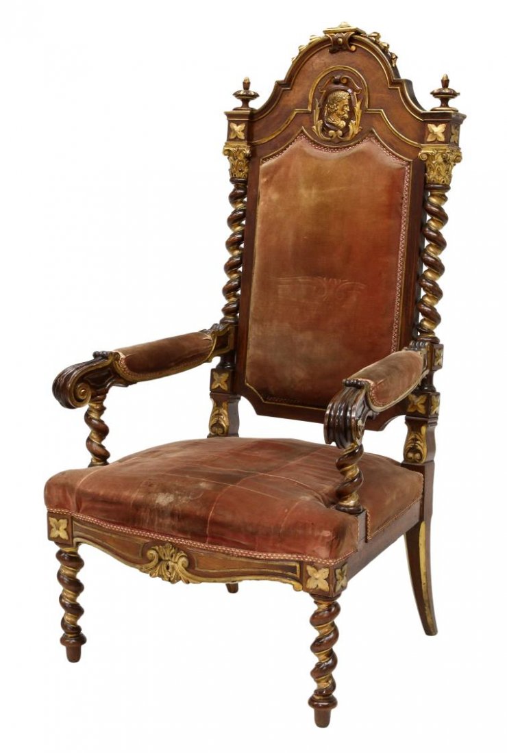 ITALIAN BAROQUE STYLE PARCEL GILT ARM CHAIR: Italian Baroque style figural walnut parcel gilt arm chair, 19th c., the high arched back centering a portrait medallion, twist uprights and padded arms terminate in scrolled hand holds, with age some