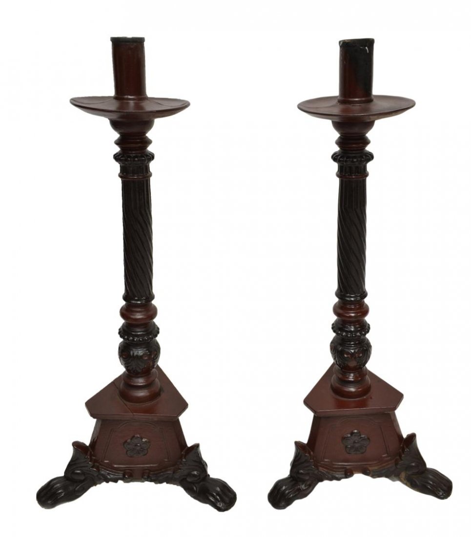 (2)FRENCH COLONIAL CARVED ALTAR LIGHTS: (pair) French Colonial red and black lacquer altar candle holders, early 20th c., turned and beaded standard caved with foliates, each on a carved paw foot tripartite base, some wear and splits with a