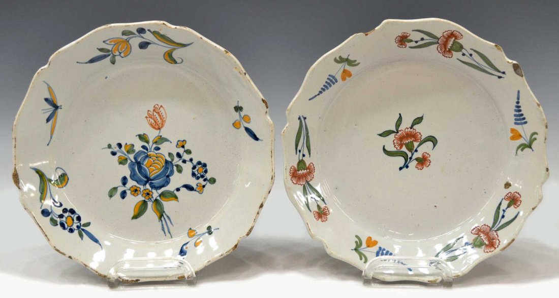 (2) ANTIQUE FRENCH FAIENCE FLORAL DECORATED PLATES: (pair) Antique French faience plates, each decorated with flowers, scalloped edge, some glaze loss, chipping to borders, 9"diam, 2.5lbs total *Provenance: From the estate of Don Yarton (Ohio, Texas, 1