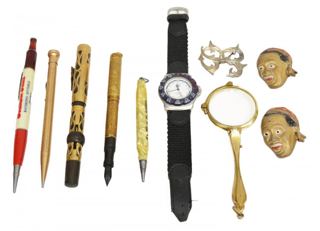 GROUP OF GOLD FILLED PENS, LORGNETTES, ETC.: (lot) Collectible group comprising a Tag Heur wrist watch, model WA1219, the band is cut at the end as pictured, vintage gold filled and other pens and pencil, gold filled lorgnettes, metal figural pi