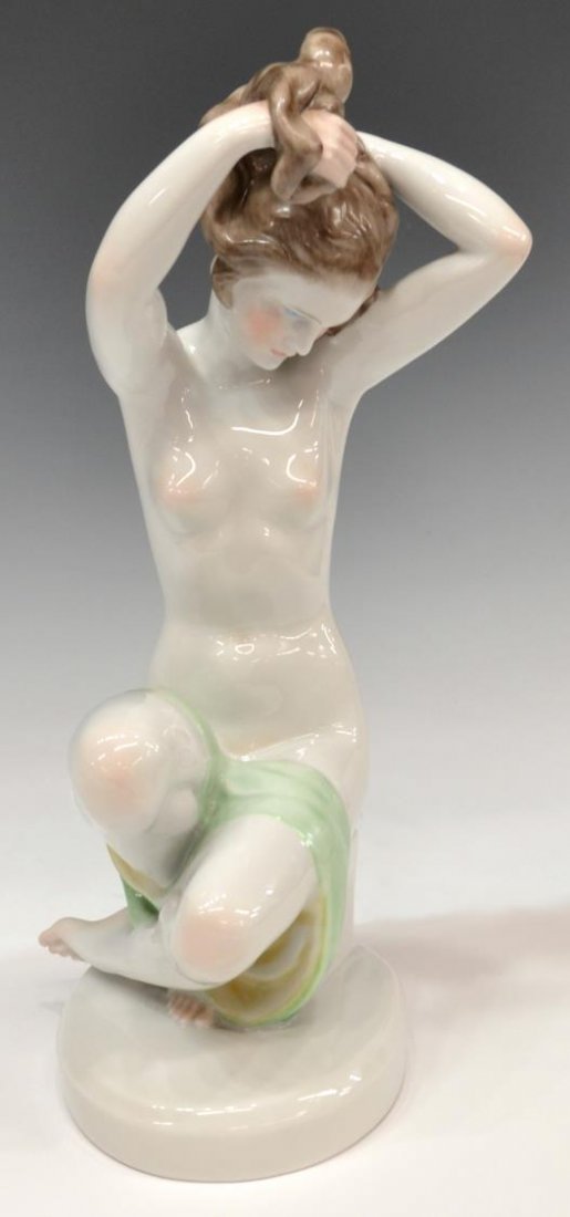 LARGE HEREND PORCELAIN FIGURE, KNEELING NUDE: Large Herend porcelain figure, Nude Combing Hair, Hungary, attributed to artist Lux Elek, unsigned, oval base, blue Herend mark and impression underfoot, 14.5"h, 6.25"w, 3.75lbs Start Price: $200.00