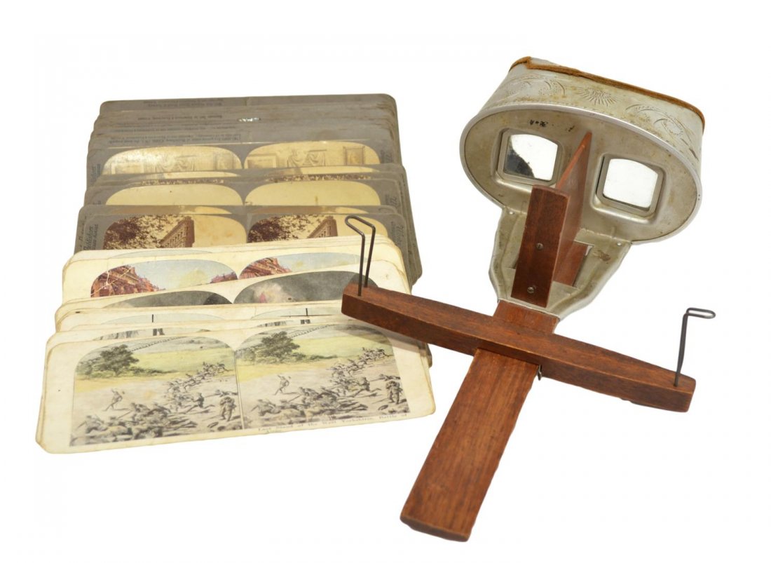 (38) STEREOSCOPE & STEREO CARDS C. 1904-1918: (lot of 38) Stereoscope and stereo cards, the Underwood & Underwood scope with patent date June 11, 1901,the stereo cards include (18) color depictions of WWI, (19) Underwood & Underwood mostly landsc